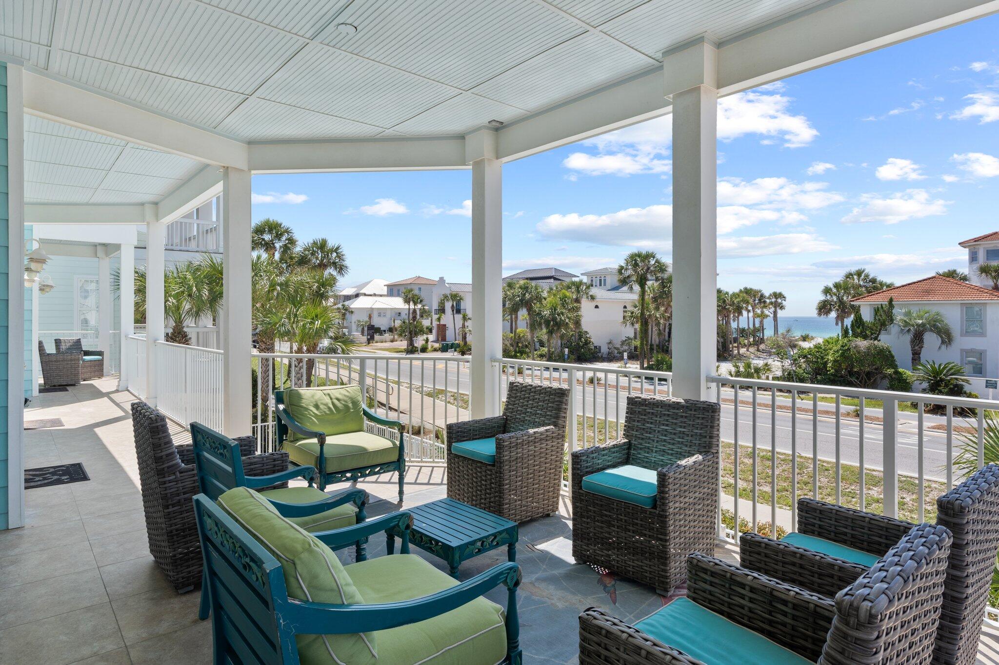4478 Ocean View Drive Destin, FL 32541 - Photo 49 of 122 a living room with furniture and a floor to ceiling window