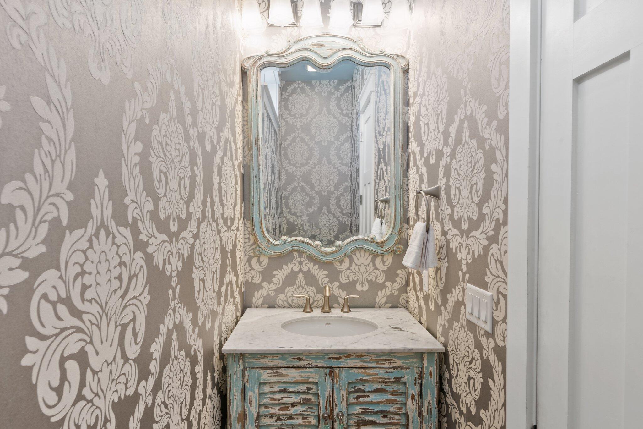 4478 Ocean View Drive Destin, FL 32541 - Photo 53 of 122 a bathroom with a sink and a mirror