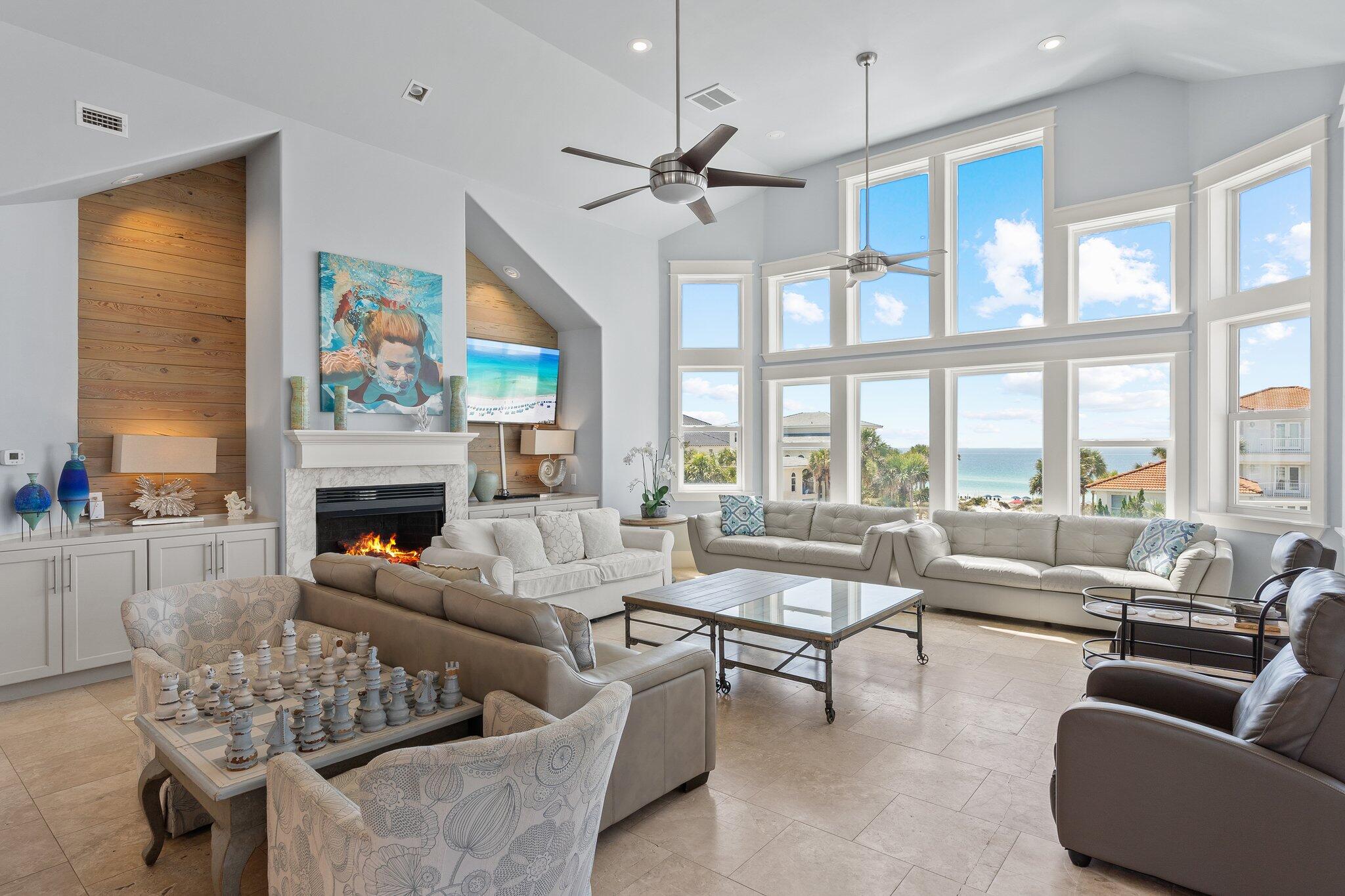 4478 Ocean View Drive Destin, FL 32541 - Photo 58 of 122 a living room with furniture fireplace and a large window