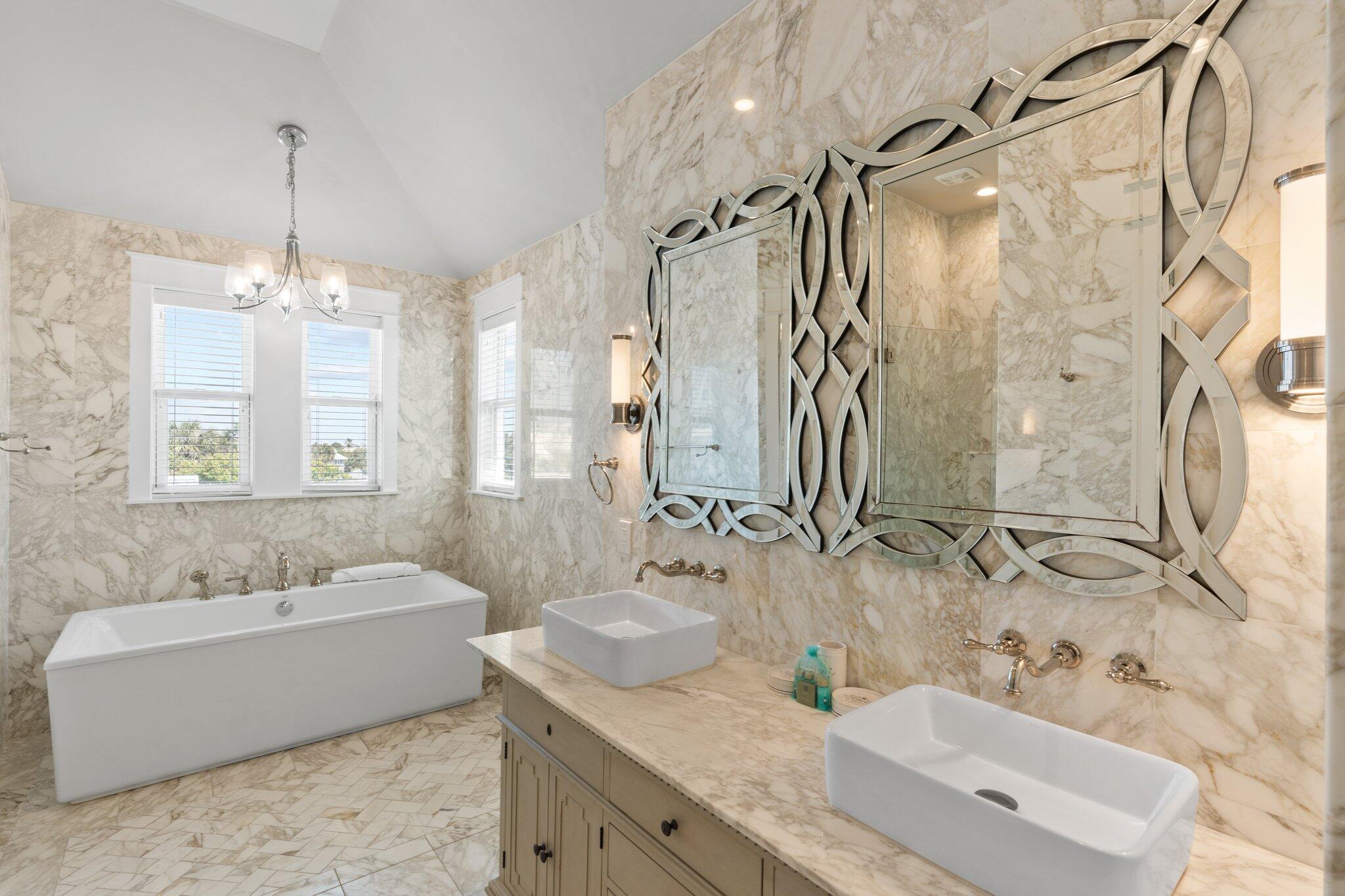 4478 Ocean View Drive Destin, FL 32541 - Photo 83 of 122 a bathroom with a granite countertop double vanity sink mirror and shower