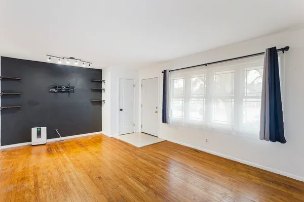 a kitchen with stainless steel appliances a refrigerator and a sink