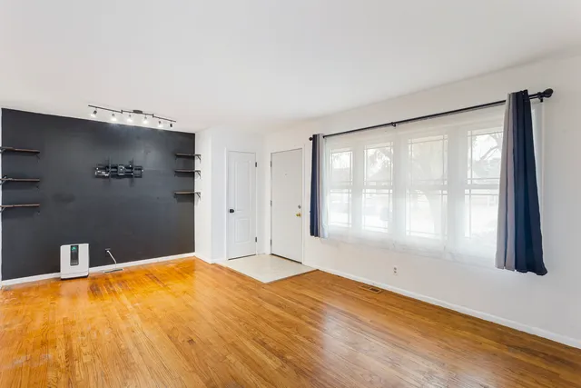 a kitchen with stainless steel appliances a refrigerator and a sink