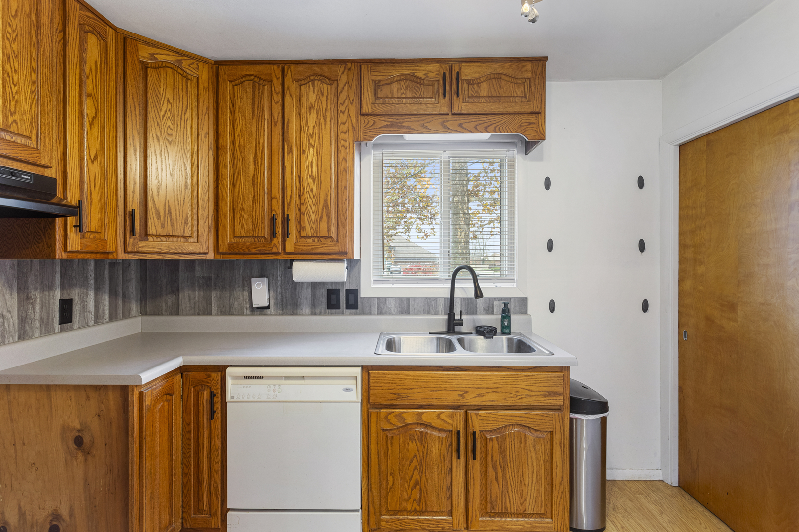 19 LaSalle Drive Decatur, IL 62521 - Photo 14 of 25 a utility room with stainless steel appliances a sink and cabinets