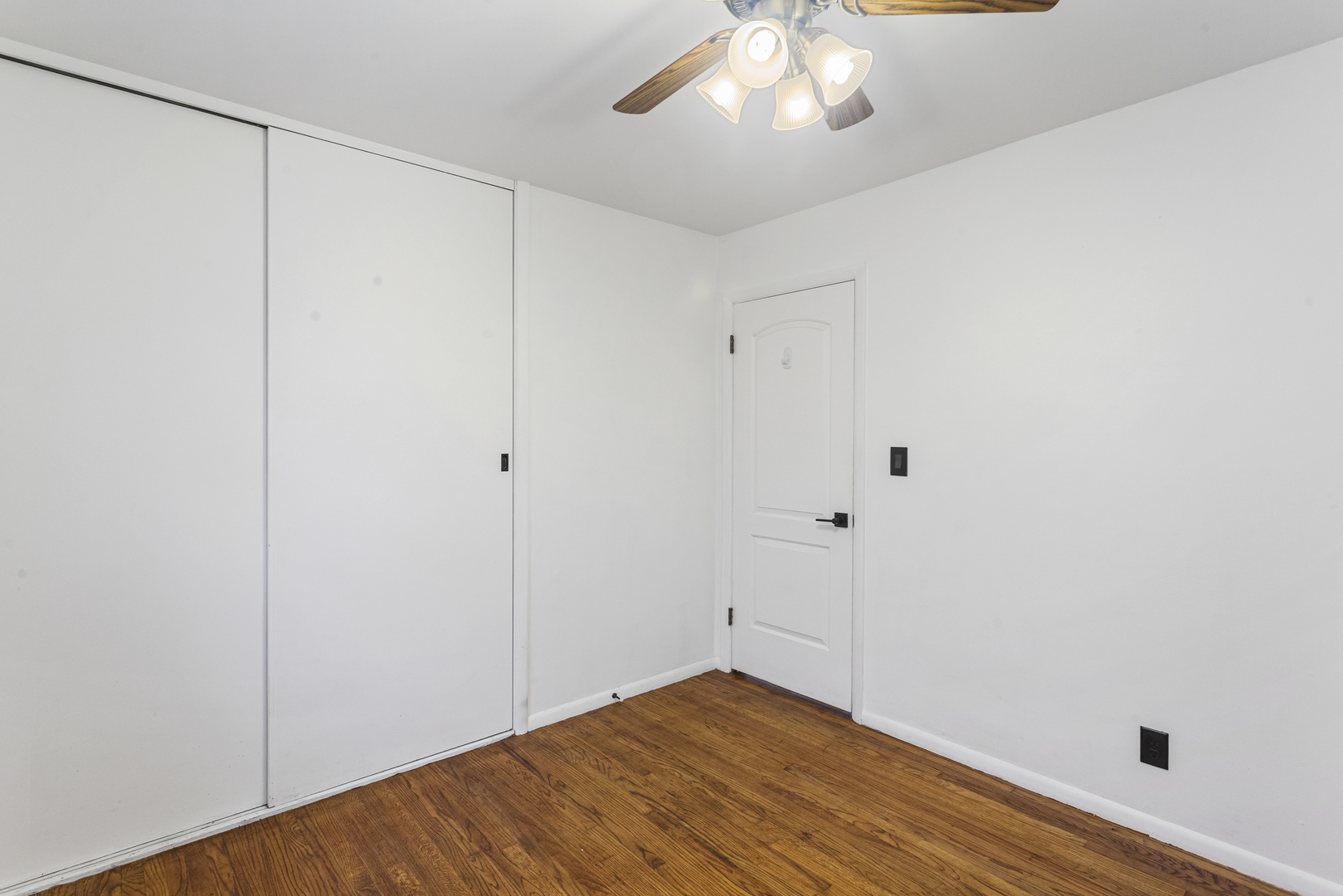 19 LaSalle Drive Decatur, IL 62521 - Photo 16 of 25 a view of an empty room with wooden floor