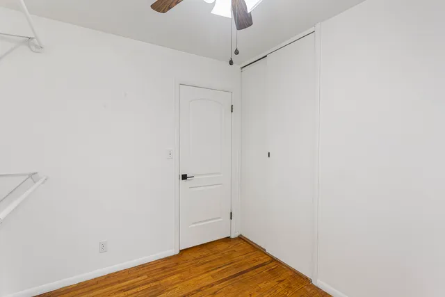 a view of an empty room with wooden roof