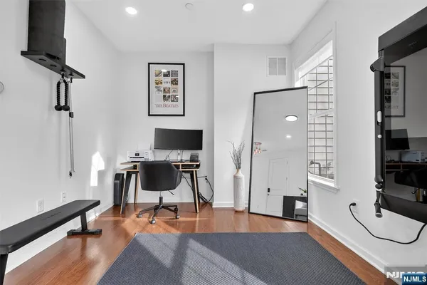 a workspace with furniture and window