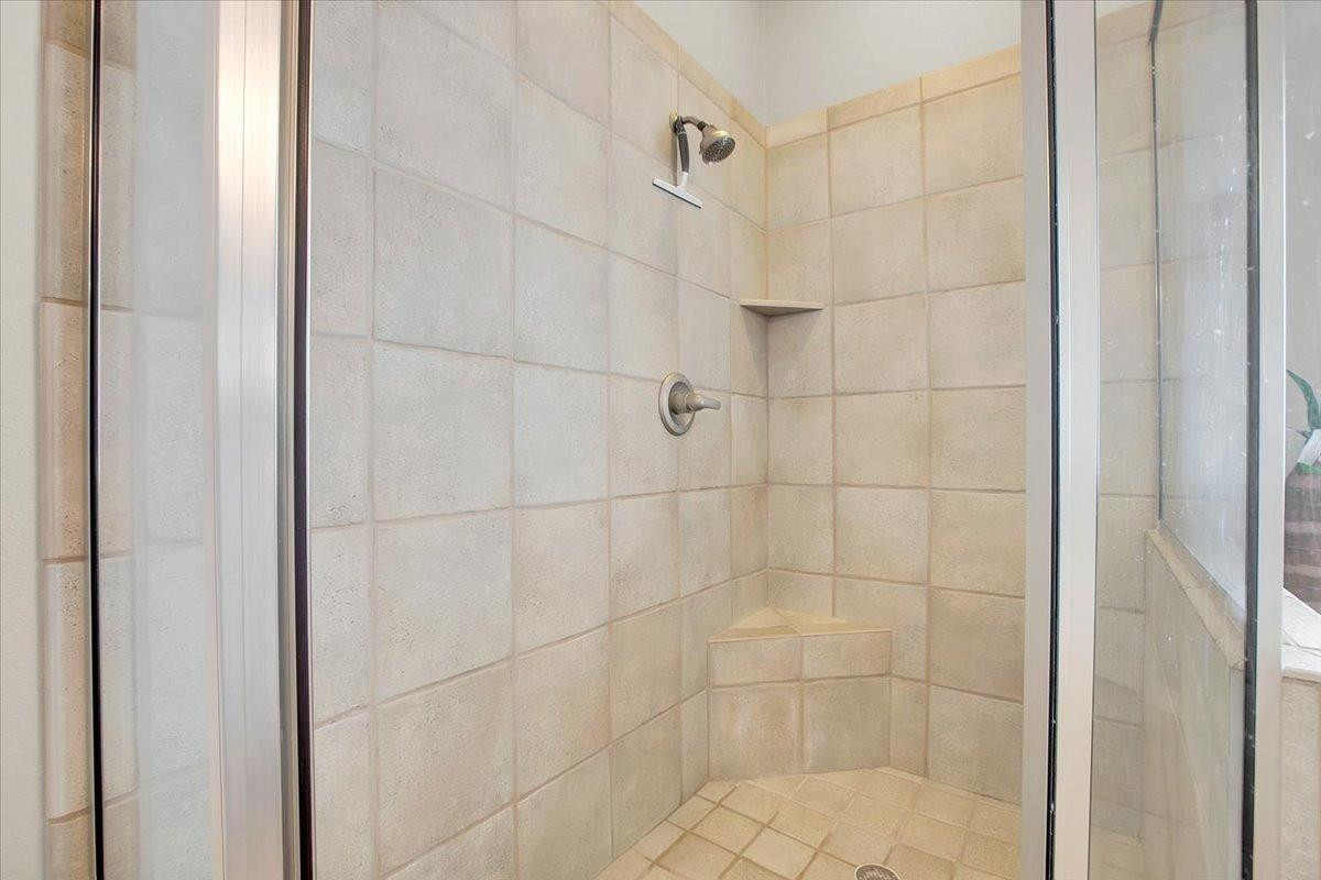 4818 104th Street Lubbock, TX 79424 - Photo 22 of 36 a bathroom with a shower
