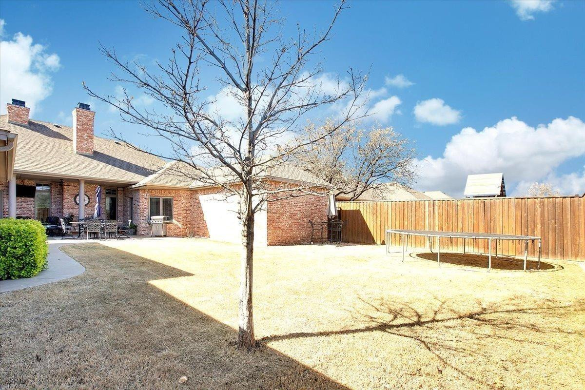 4818 104th Street Lubbock, TX 79424 - Photo 34 of 36 a view of a house with snow on the road