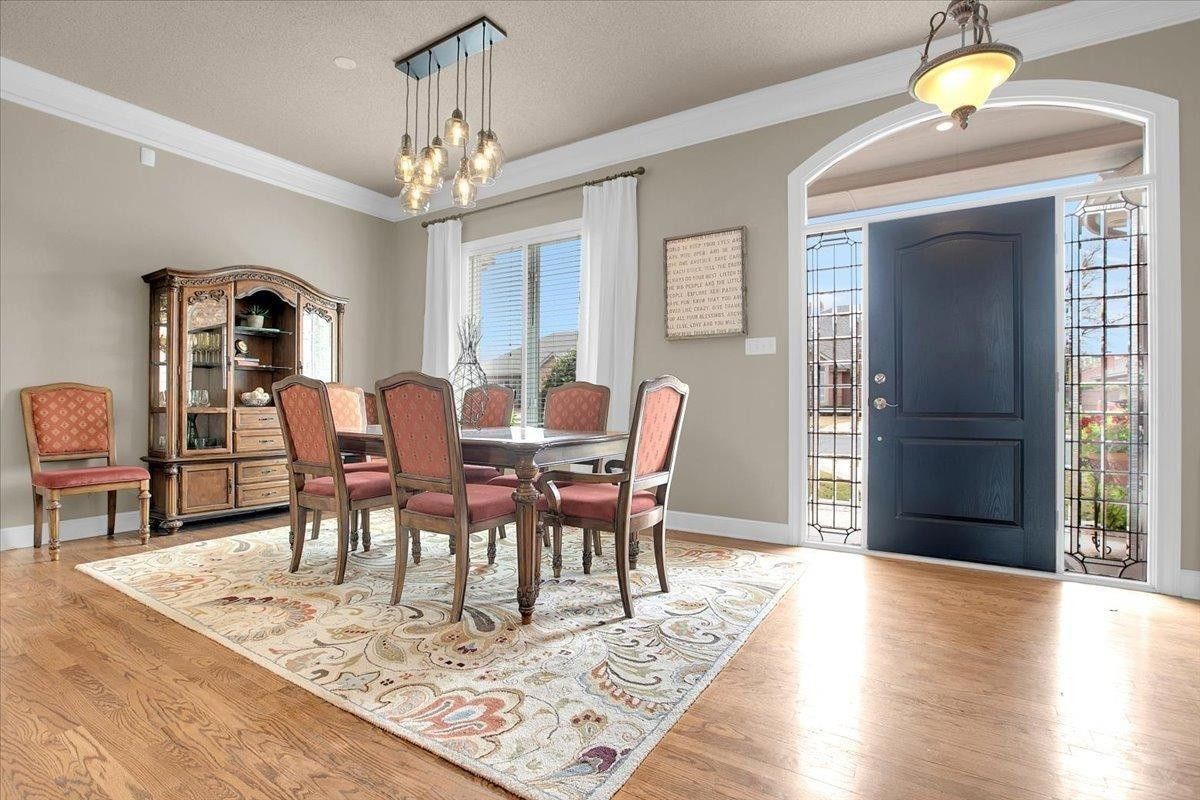 4818 104th Street Lubbock, TX 79424 - Photo 5 of 36 a view of a dining room with furniture