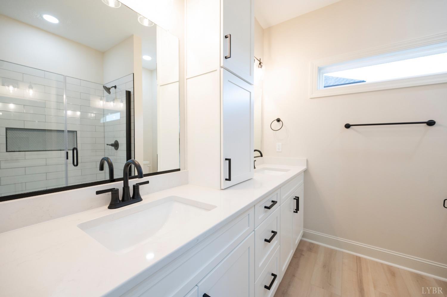 2329 Perrowville Road Forest, VA 24551 - Photo 35 of 54 En Suite bathroom features quartz countertops, double sink vanity, additional storage