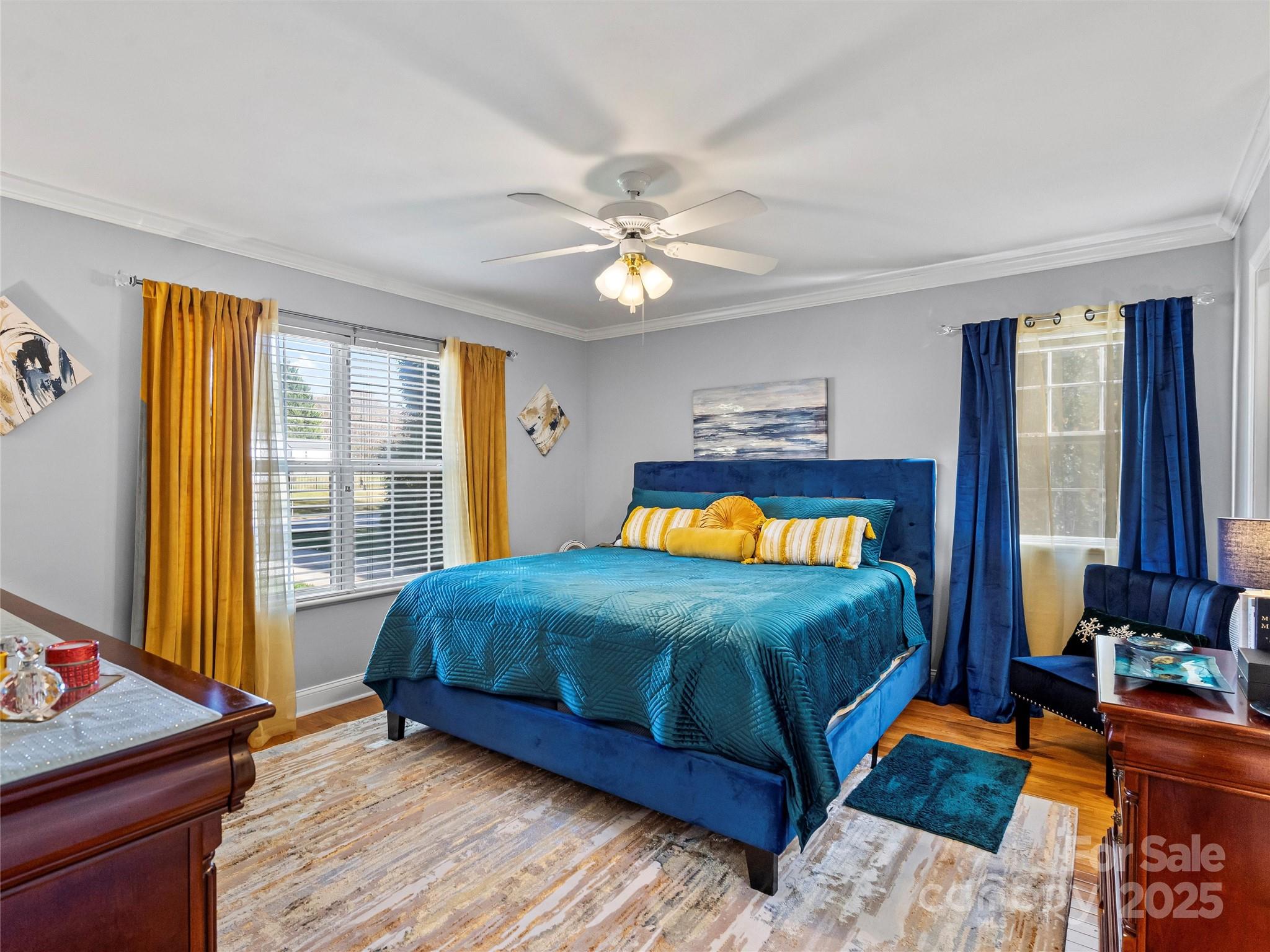 1002 4th Street Northeast Conover, NC 28613 - Photo 13 of 47 a bed sitting in a bedroom next to a window