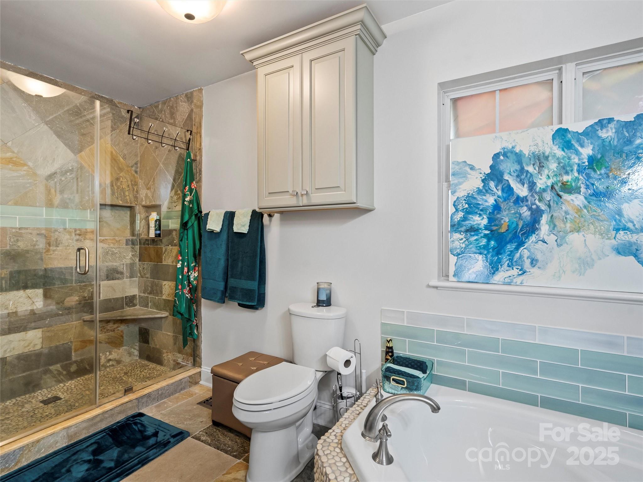 1002 4th Street Northeast Conover, NC 28613 - Photo 18 of 47 a bathroom with a sink toilet and shower