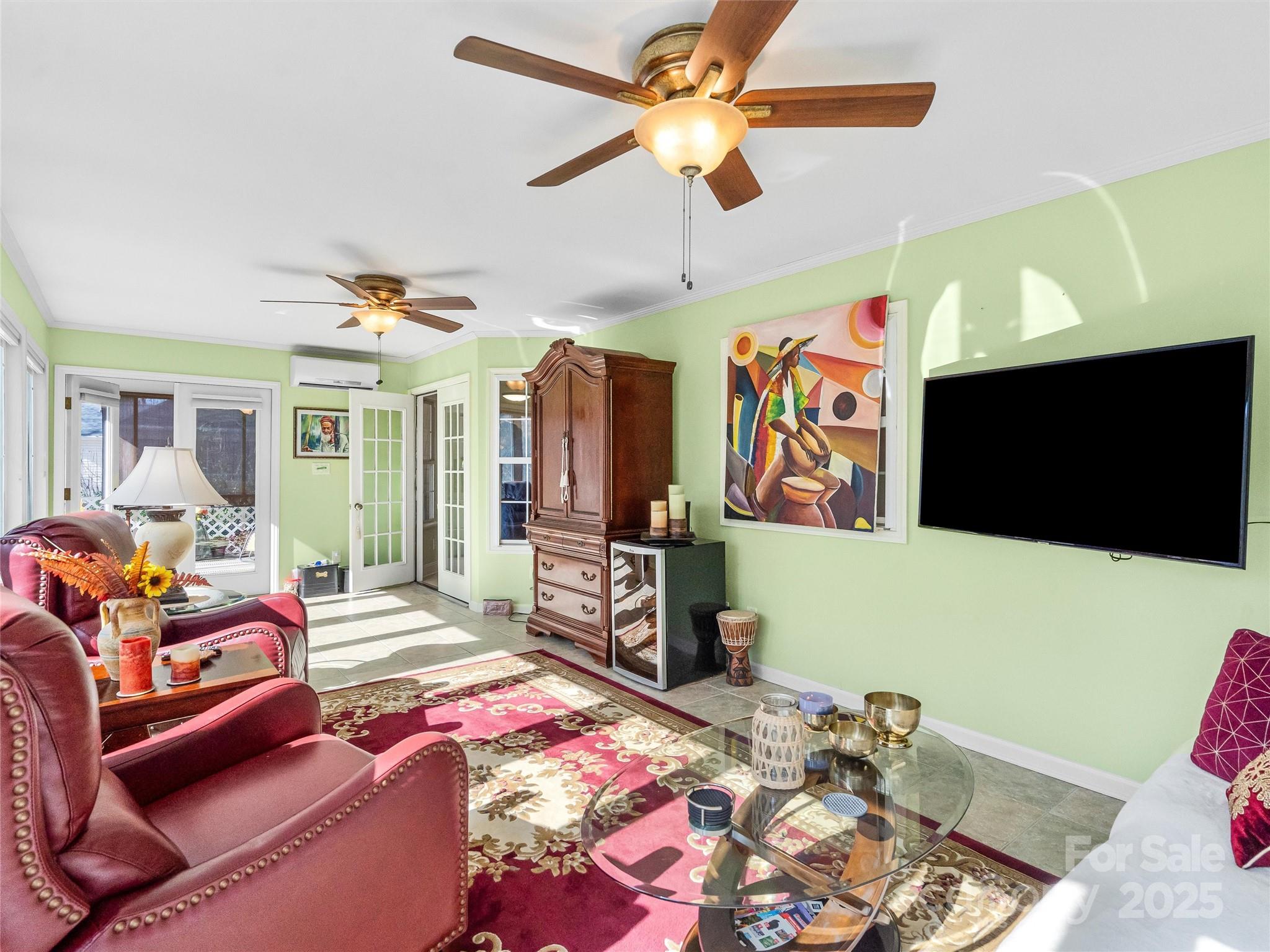 1002 4th Street Northeast Conover, NC 28613 - Photo 27 of 47 a bedroom with furniture and a flat screen tv