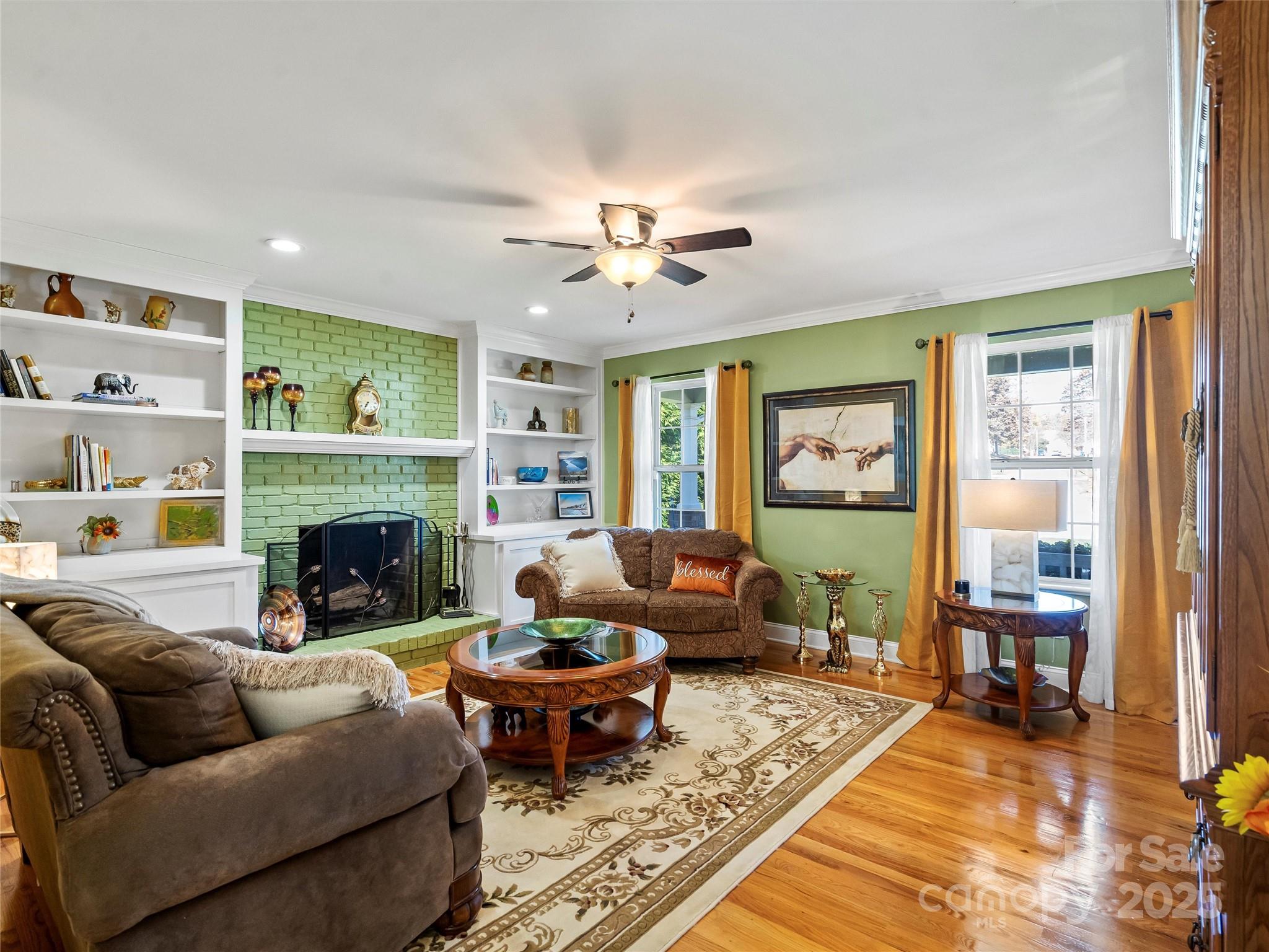 1002 4th Street Northeast Conover, NC 28613 - Photo 6 of 47 a living room with furniture and a fireplace