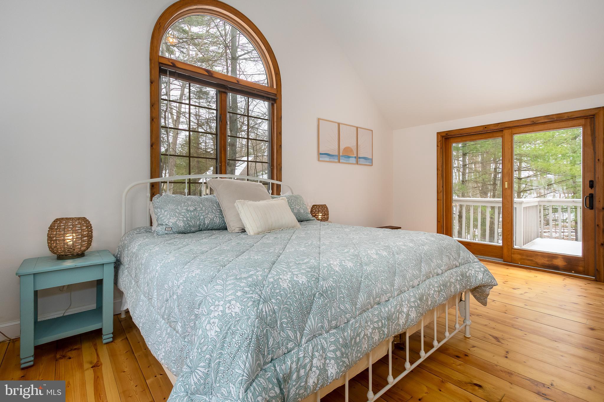 1038 South Blakeslee Road Oakland, MD 21550 - Photo 22 of 69 a bedroom with a bed and a window