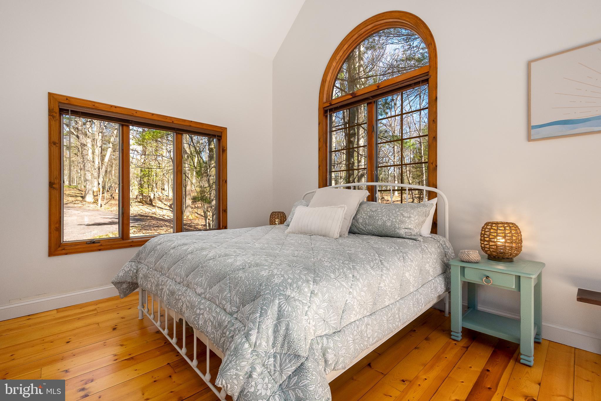1038 South Blakeslee Road Oakland, MD 21550 - Photo 23 of 69 a bedroom with a bed and a window