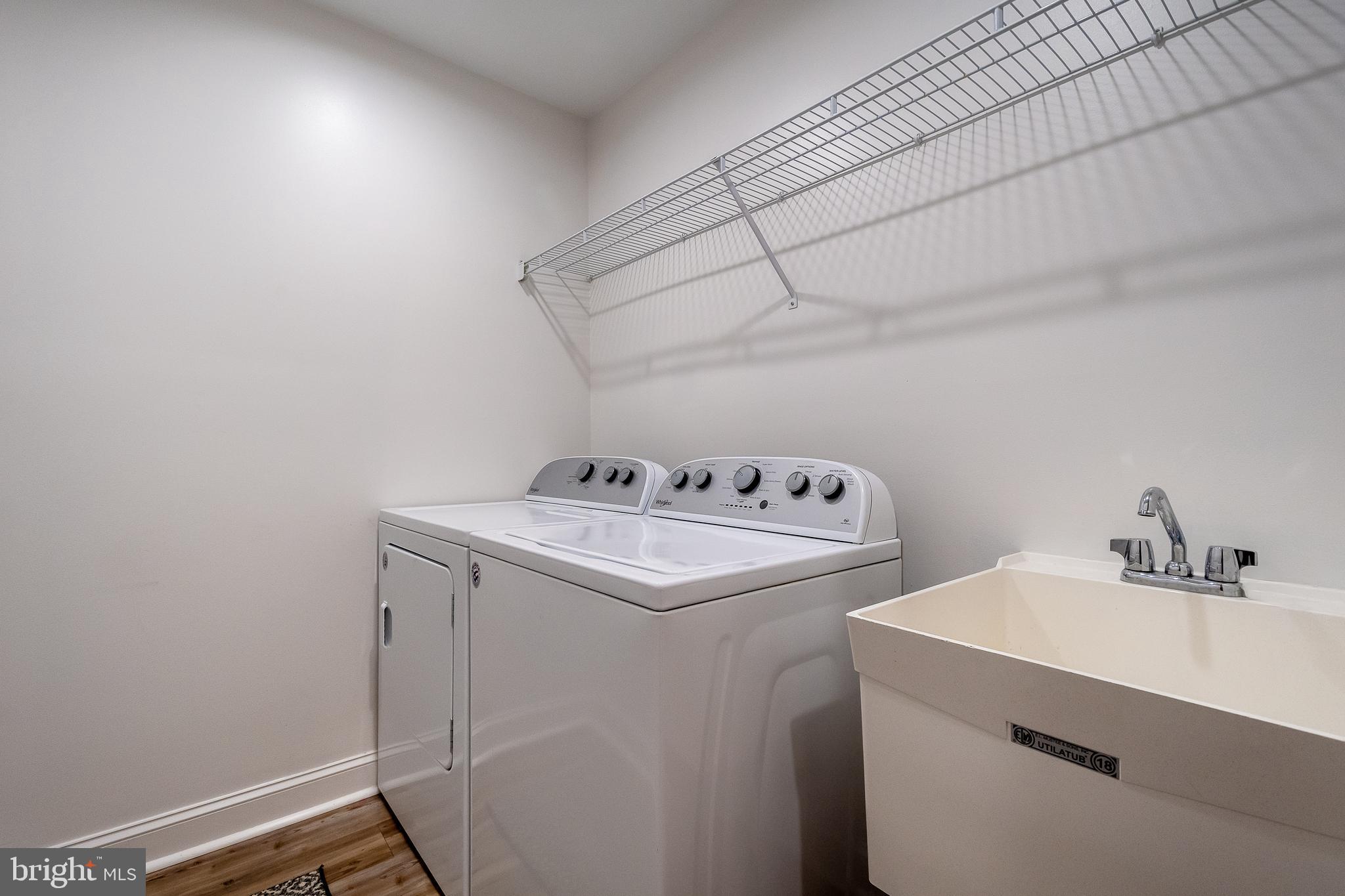 1038 South Blakeslee Road Oakland, MD 21550 - Photo 53 of 69 a utility room with dryer and washer