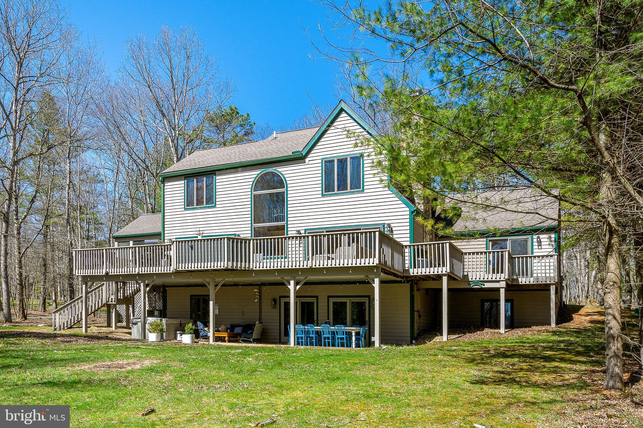 1038 South Blakeslee Road Oakland, MD 21550 - Photo 55 of 69 a front view of a house with a yard