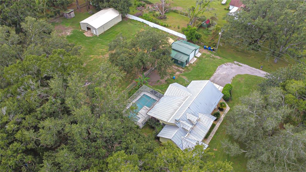 16349 Spring Valley Road Dade City, FL 33523 - Photo 37 of 40 an aerial view of a house with outdoor space