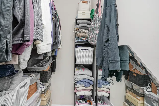 a bathroom with a sink vanity and a mirror