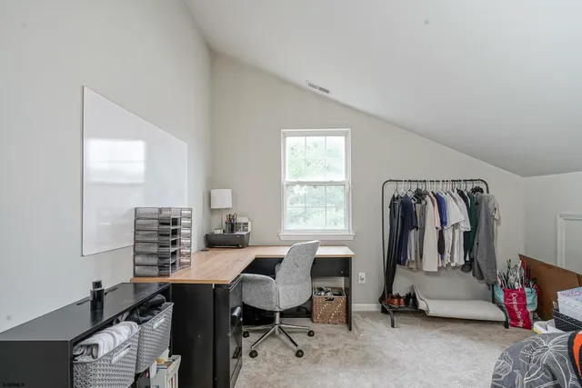 a view of a balcony with furniture