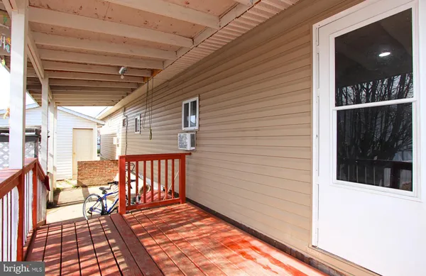 a view of backyard with cabin