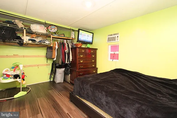 a bed room with a bed and a window