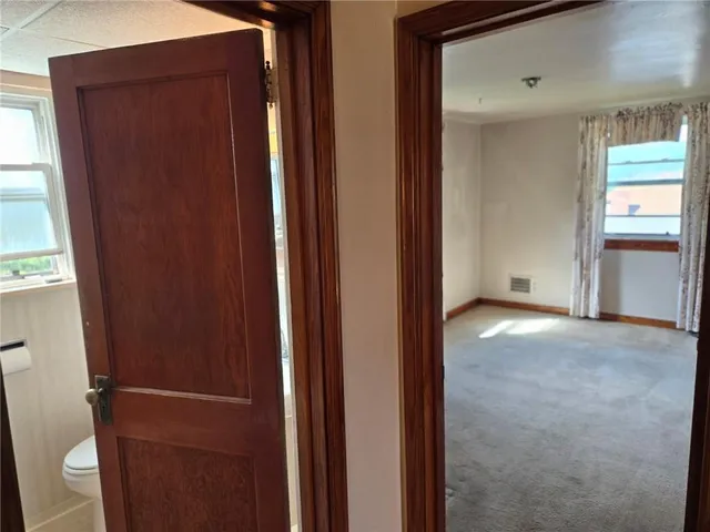 an empty room with windows