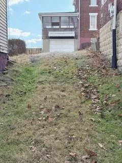 a bathroom with a shower and a toilet