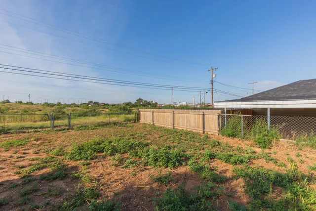 a view of a lake with a big yard