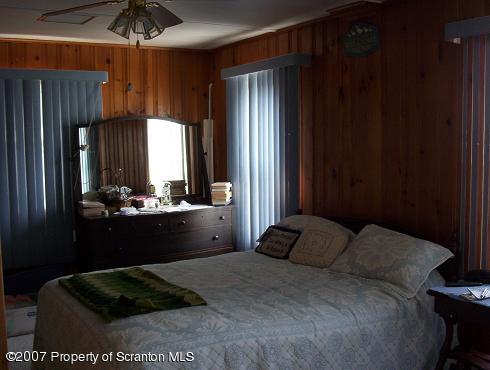 0 Ridge Road Mapleton Depot, PA 17052 - Photo 7 of 10 a bedroom with a bed window and cabinet