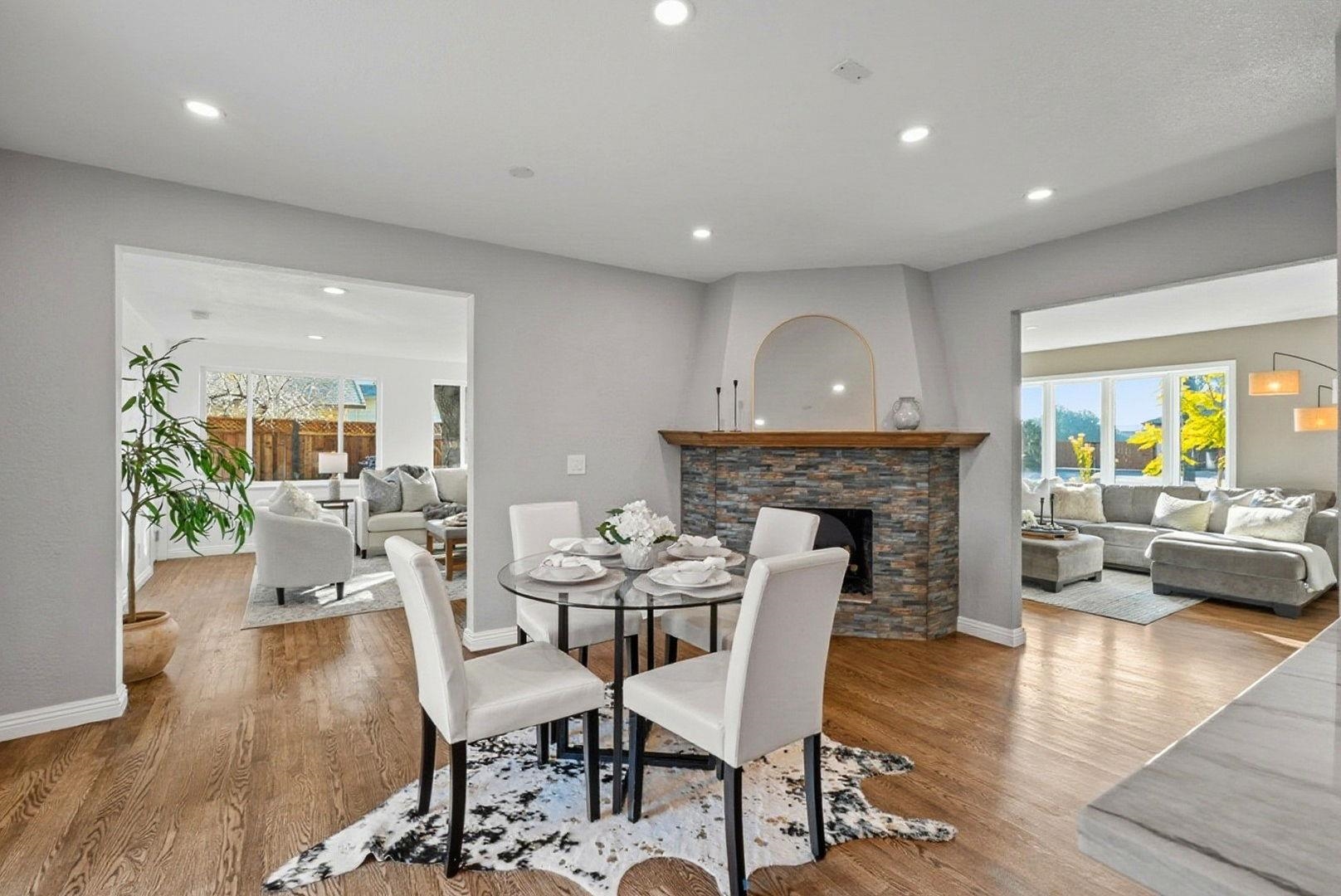 1368 Pegan Common Livermore, CA 94550 - Photo 11 of 47 a dining room with furniture and wooden floor