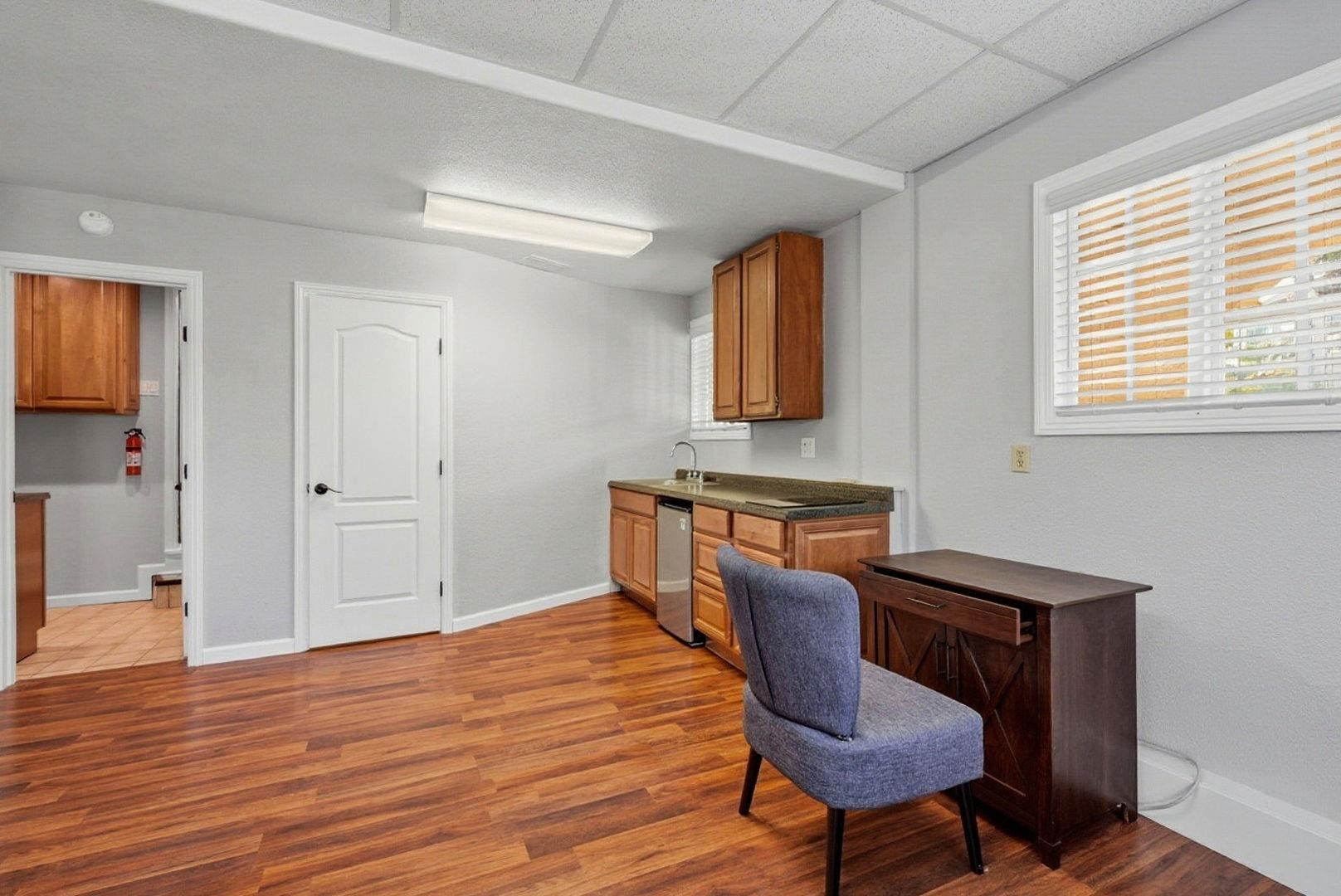 1368 Pegan Common Livermore, CA 94550 - Photo 35 of 47 a view of a workspace with furniture and wooden floor