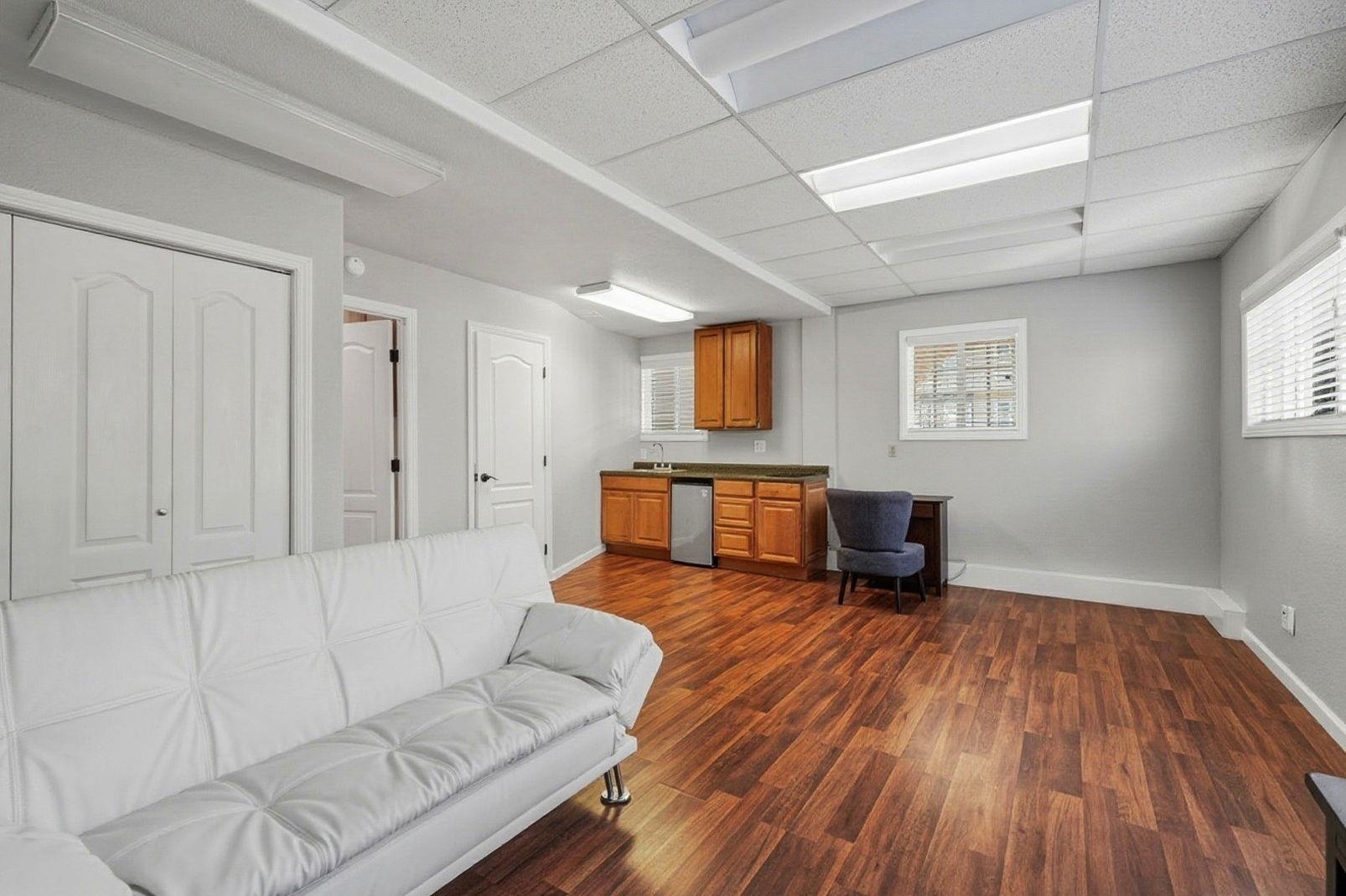 1368 Pegan Common Livermore, CA 94550 - Photo 36 of 47 a living room with furniture and a wooden floor