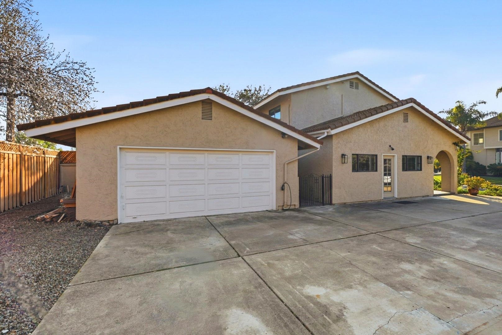 1368 Pegan Common Livermore, CA 94550 - Photo 43 of 47 a view of a house with a yard and garage
