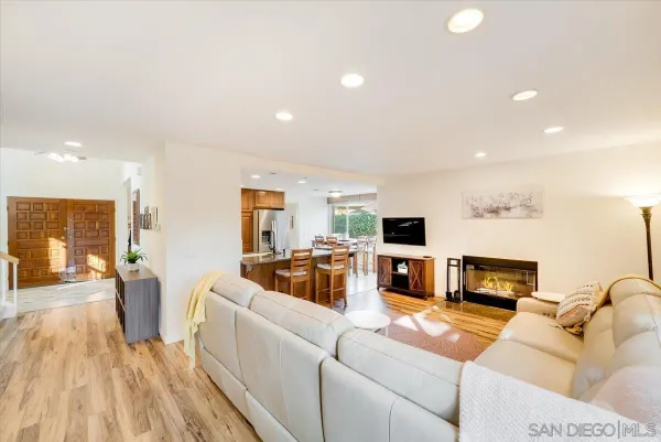 a kitchen with granite countertop stainless steel appliances and cabinets