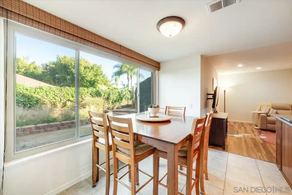a bedroom with a bed and ceiling fan