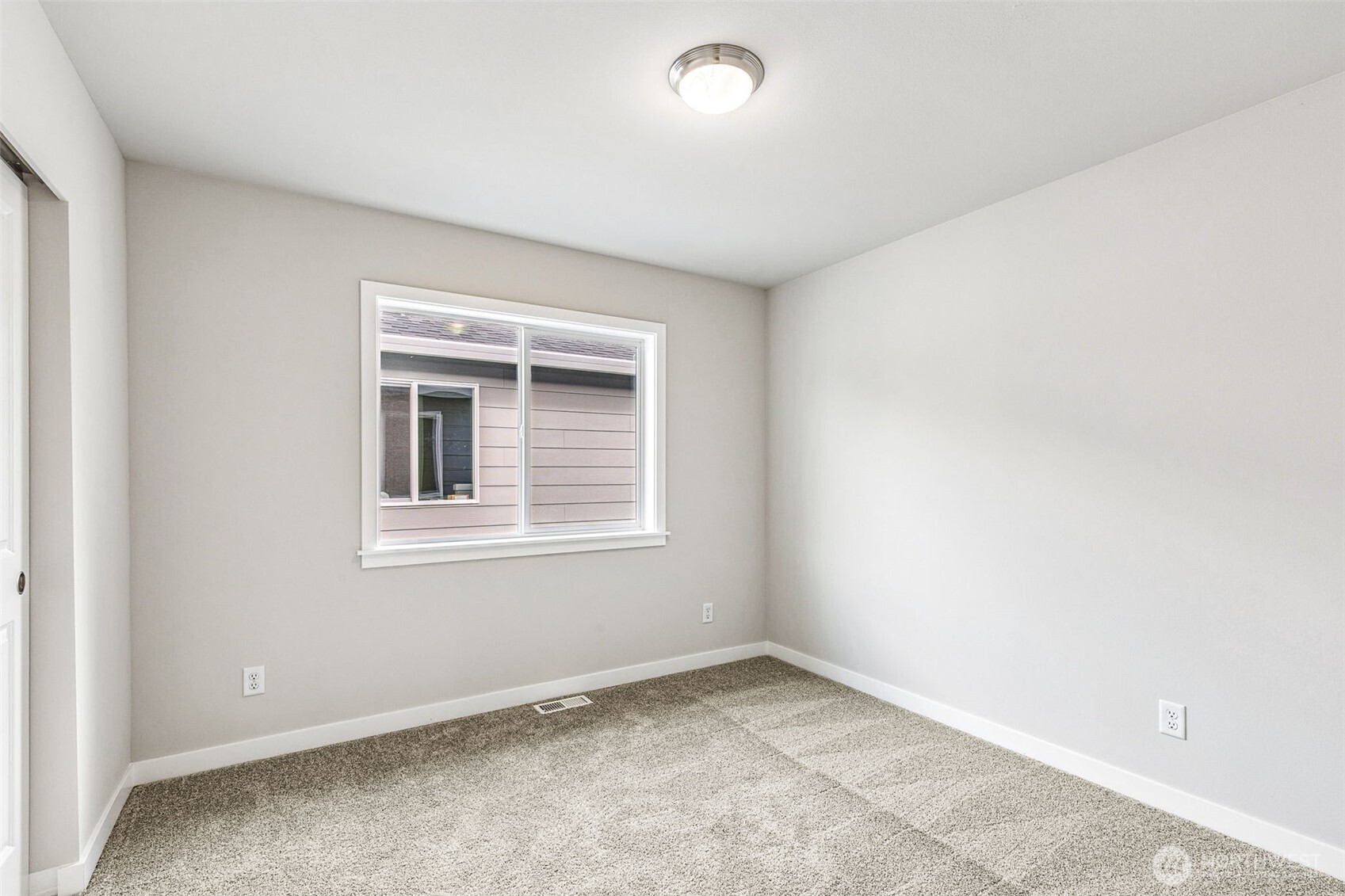 13406 323rd Drive Southeast Sultan, WA 98294 - Photo 20 of 29 an empty room with a window