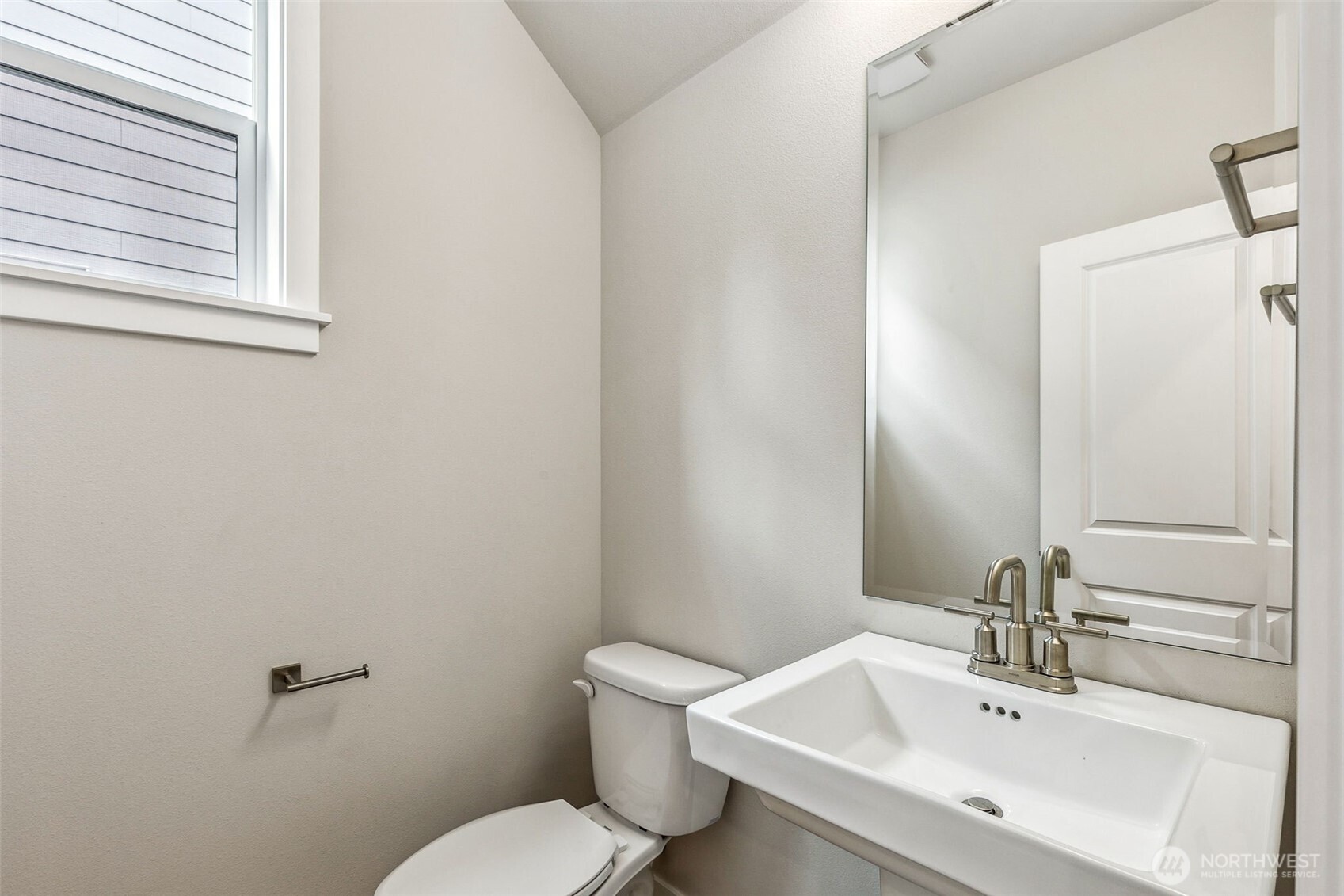 13406 323rd Drive Southeast Sultan, WA 98294 - Photo 3 of 29 a bathroom with a sink a toilet and a mirror