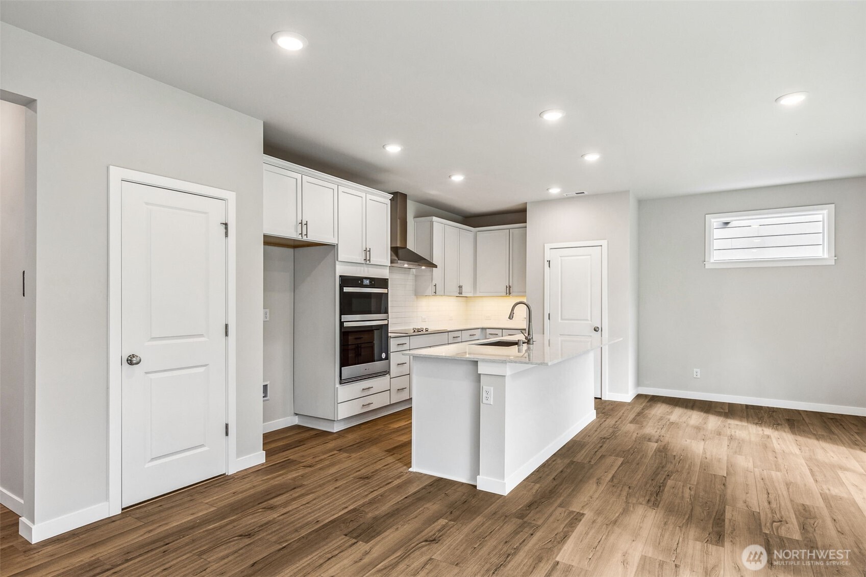 13406 323rd Drive Southeast Sultan, WA 98294 - Photo 6 of 29 a kitchen with stainless steel appliances a refrigerator and a stove top oven