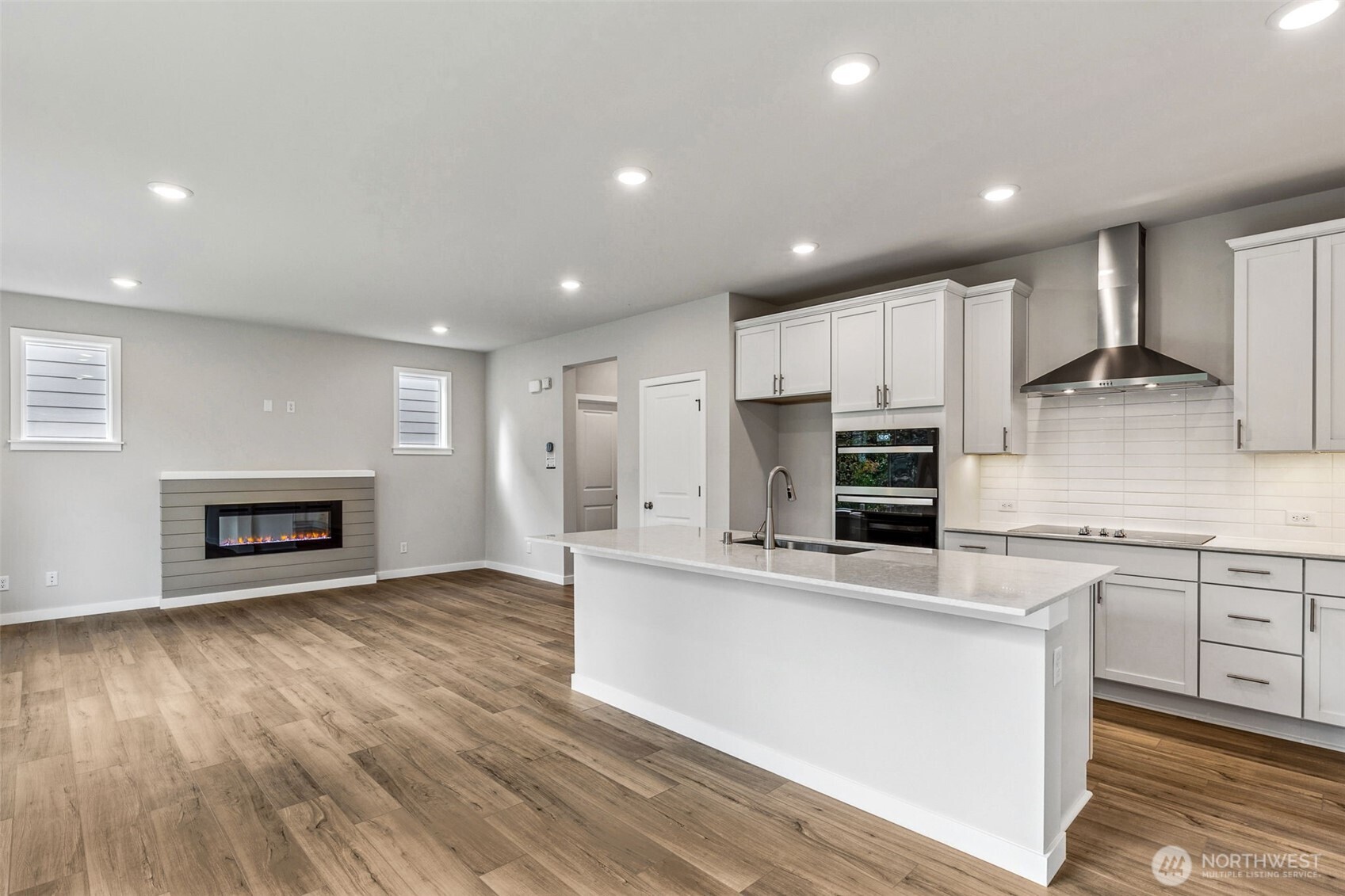 13406 323rd Drive Southeast Sultan, WA 98294 - Photo 8 of 29 a large kitchen with cabinets and stainless steel appliances