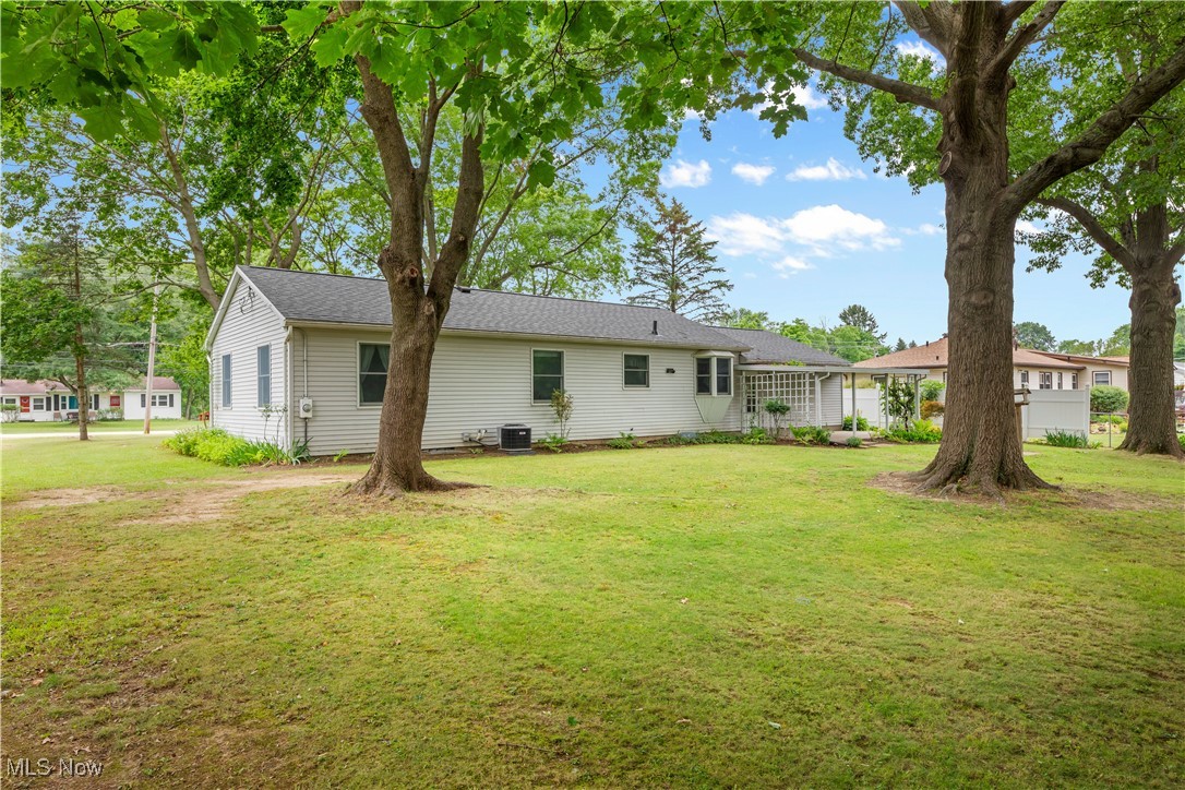 900 Ryan Road Medina, OH 44256 - Photo 28 of 40 Back of house featuring a yard