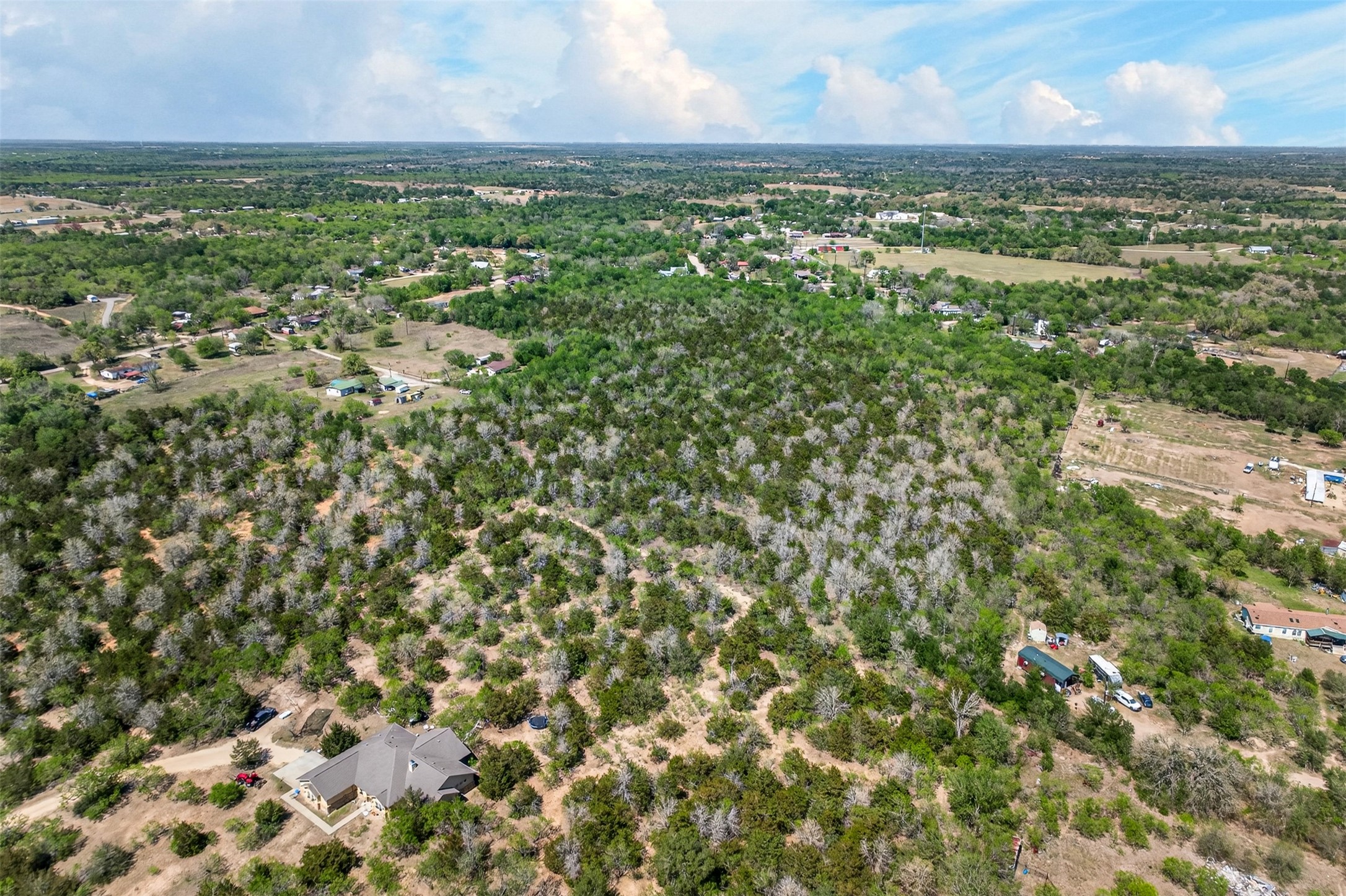 0 Fm 1854 Rd Dale Dale, TX 78616 - Photo 18 of 29 an aerial view of residential houses with outdoor space and trees
