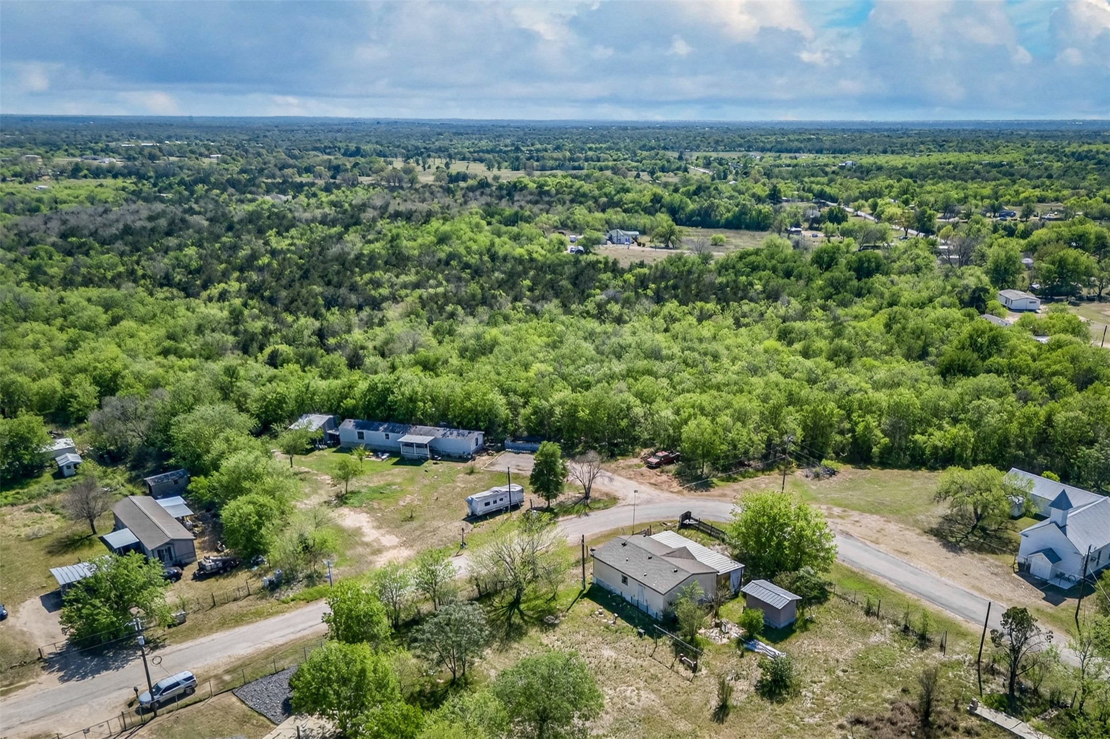 0 Fm 1854 Rd Dale Dale, TX 78616 - Photo 23 of 29 a view of a yard with plants and large trees