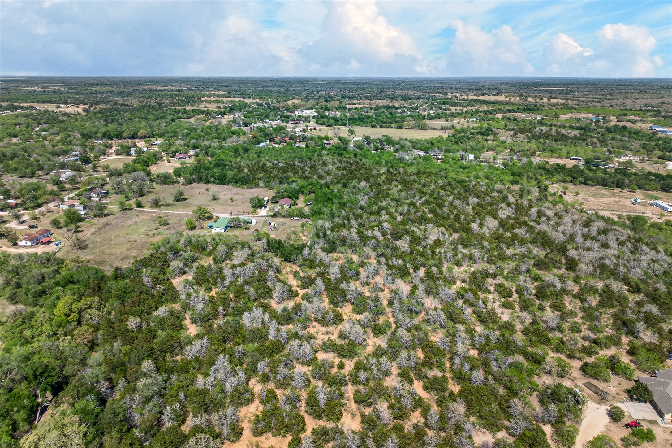 0 Fm 1854 Rd Dale Dale, TX 78616 - Photo 26 of 29 an aerial view of residential houses with outdoor space and trees