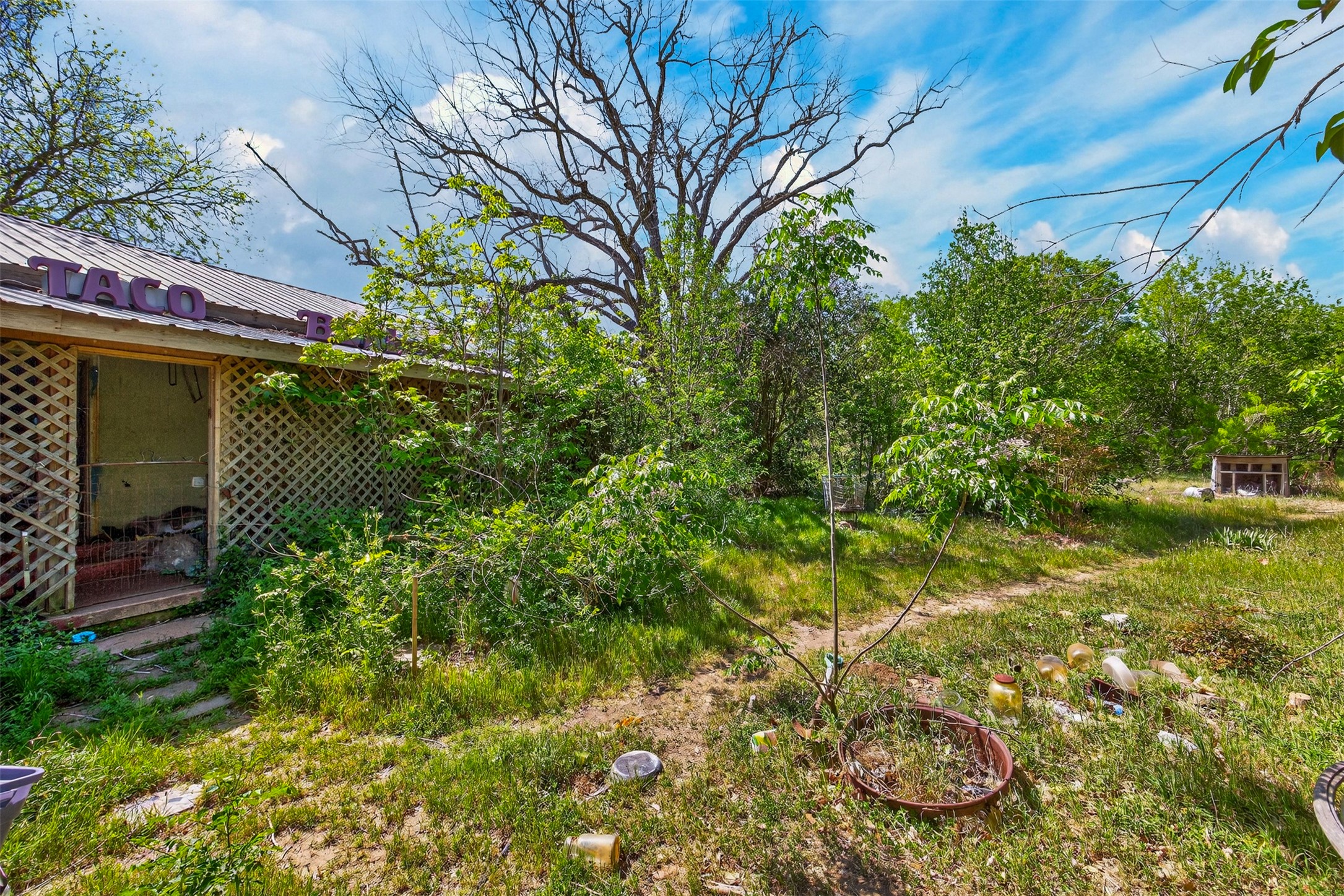 0 Fm 1854 Rd Dale Dale, TX 78616 - Photo 29 of 29 a yellow house with lots of trees