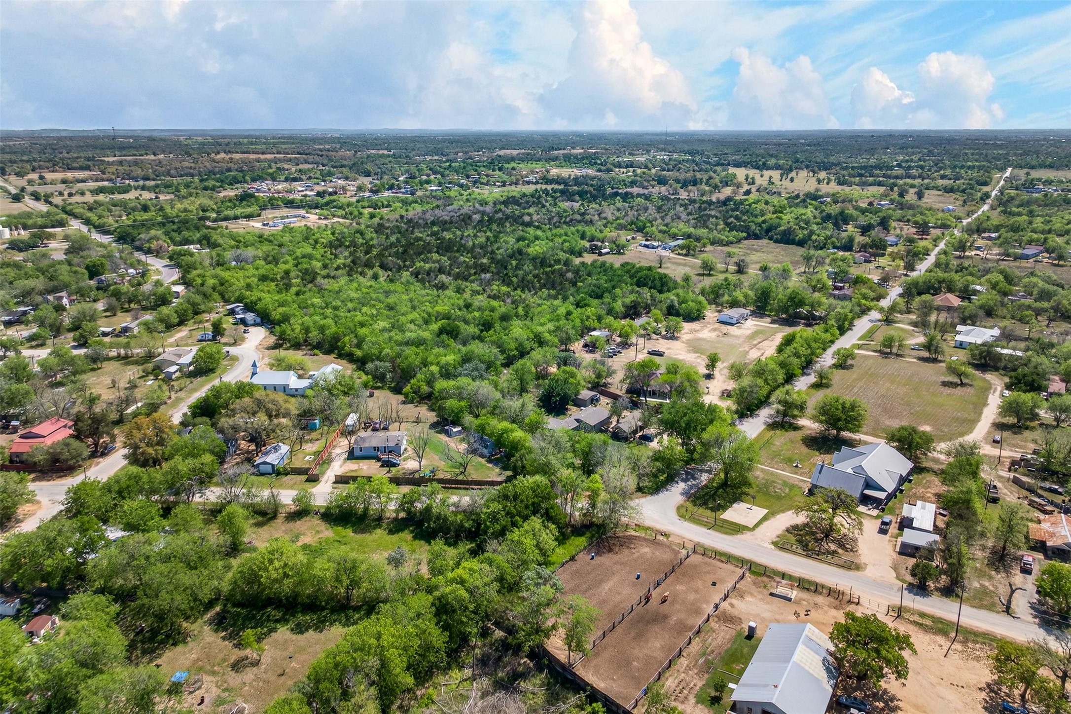 0 Fm 1854 Rd Dale Dale, TX 78616 - Photo 4 of 29 an aerial view of residential houses with outdoor space and trees
