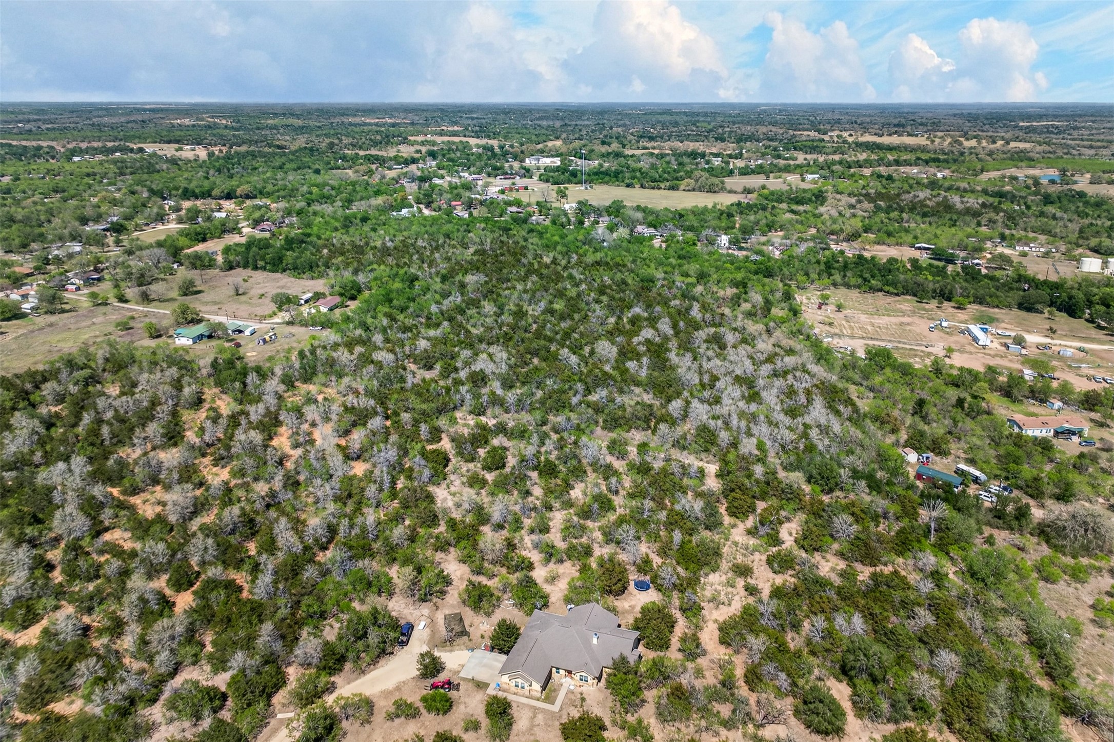 0 Fm 1854 Rd Dale Dale, TX 78616 - Photo 9 of 29 an aerial view of residential houses with outdoor space and trees