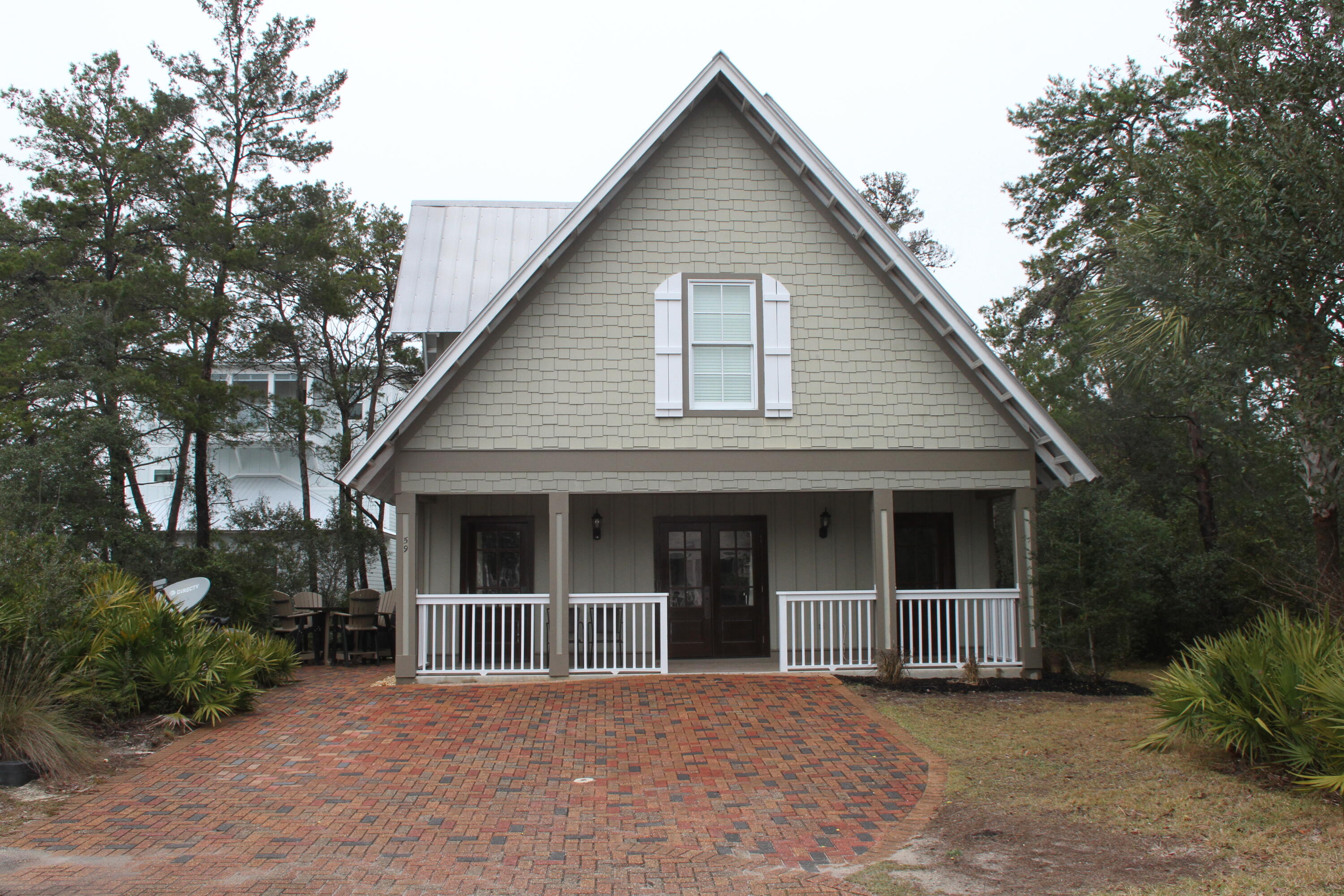 59 Willow Mist Road Inlet Beach, FL 32461 - Photo 1 of 22 a view of front a house with a large window and potted plants