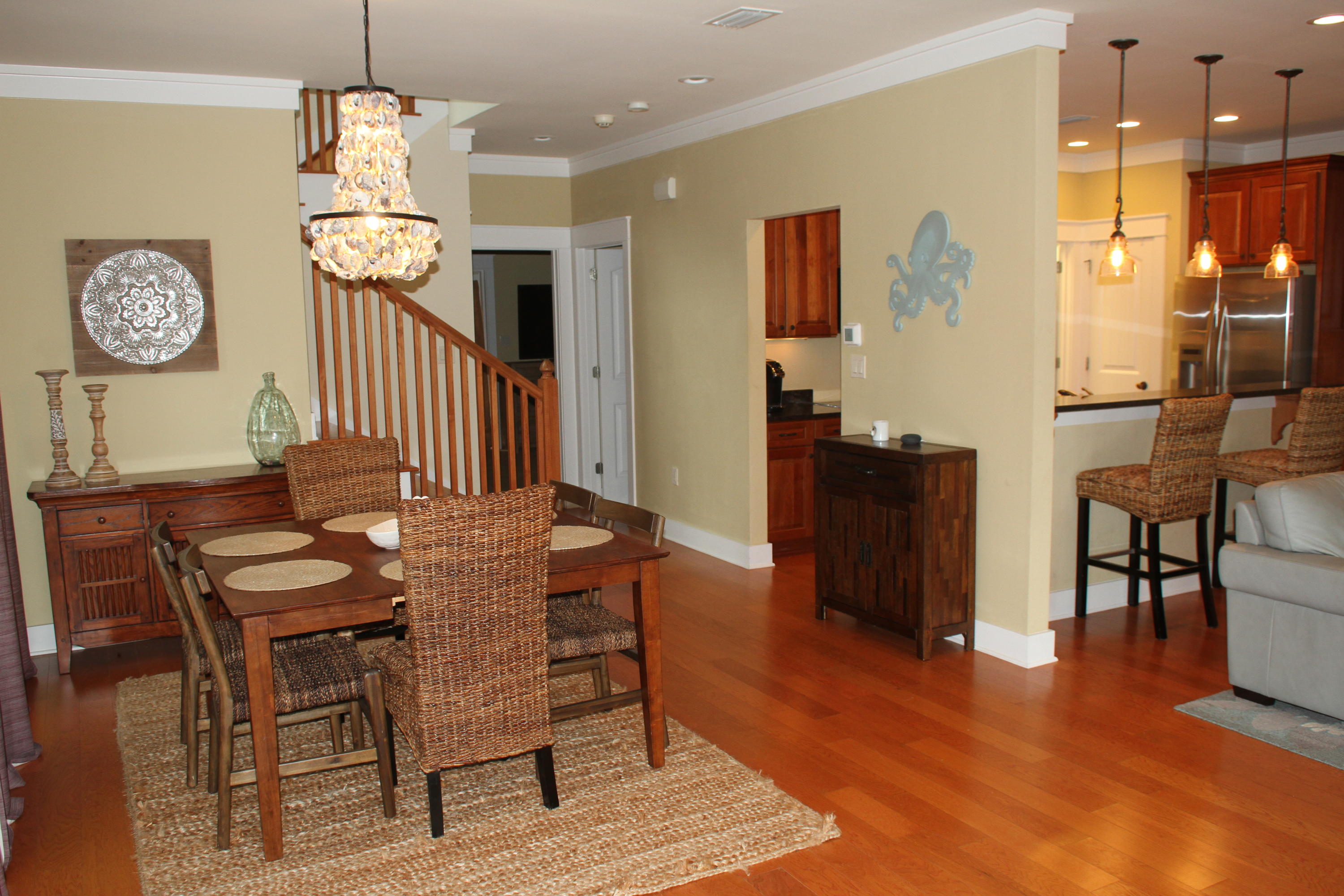 59 Willow Mist Road Inlet Beach, FL 32461 - Photo 4 of 22 a dining room with furniture a chandelier and wooden floor